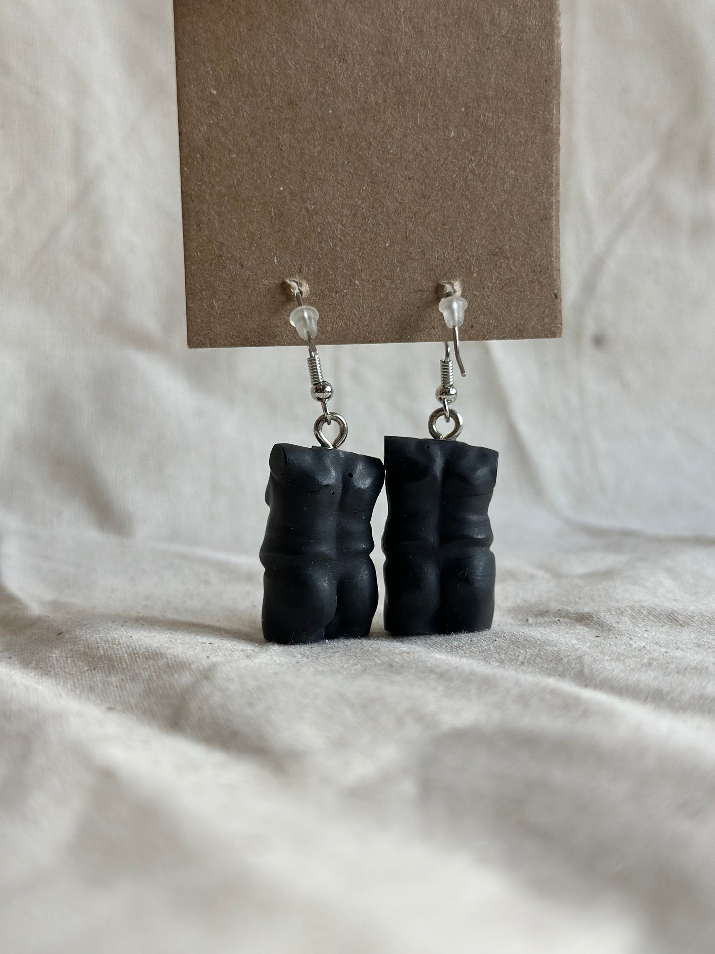 Plus size male body earrings in black - silver hooks