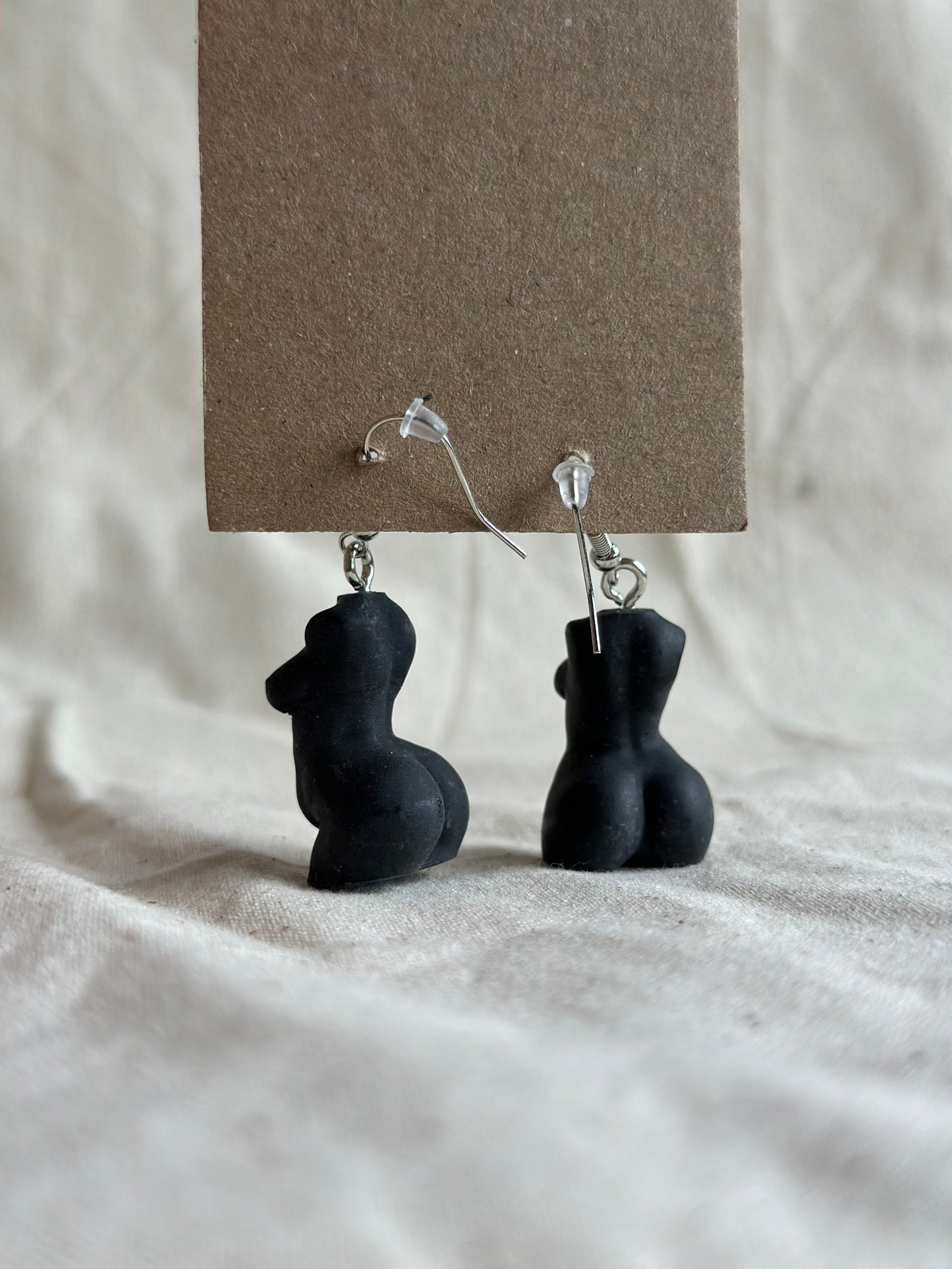 Plus size female body earrings in black - silver hooks