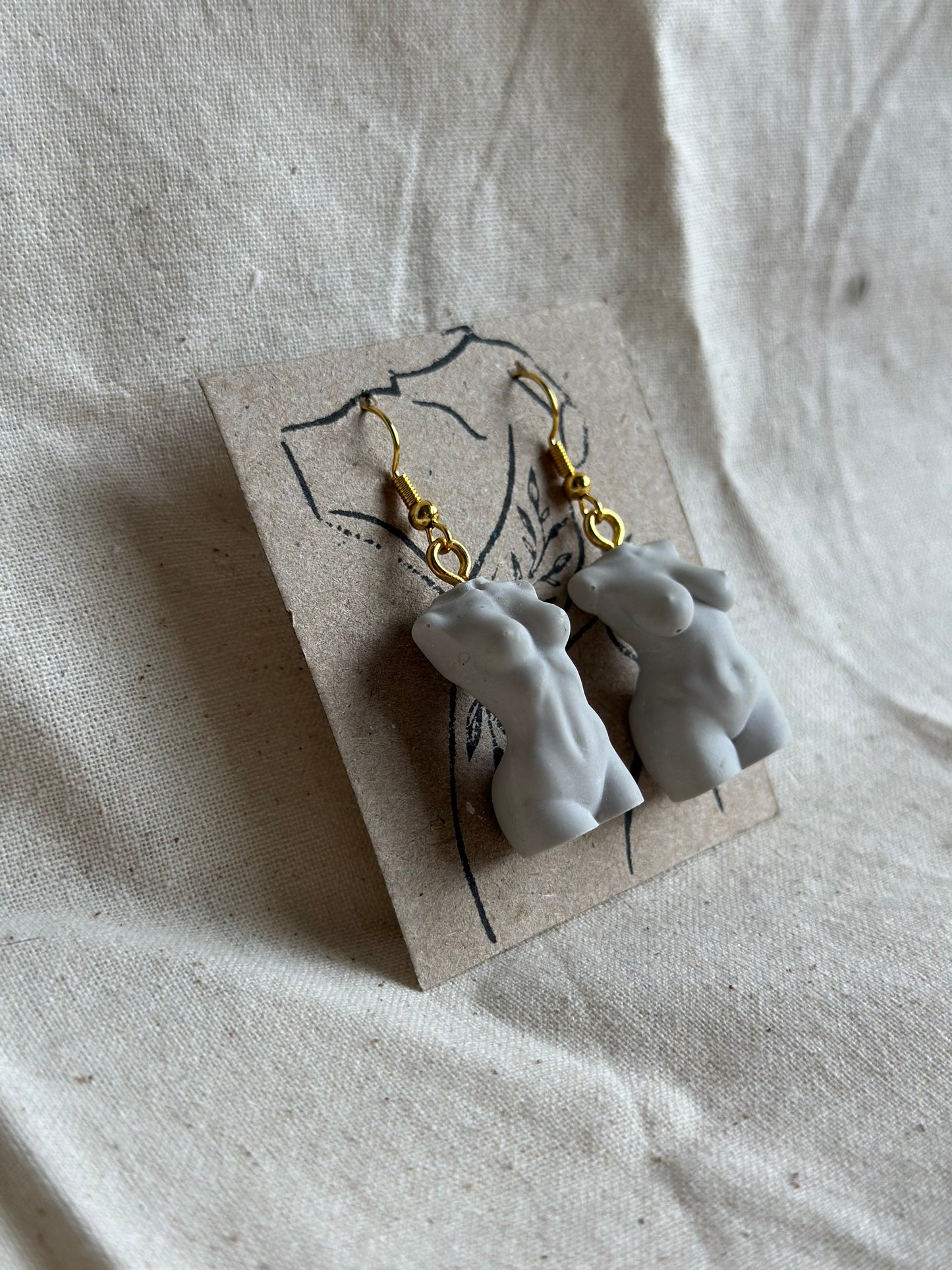 Plus size & athletic female body earrings in very light grey - gold hooks