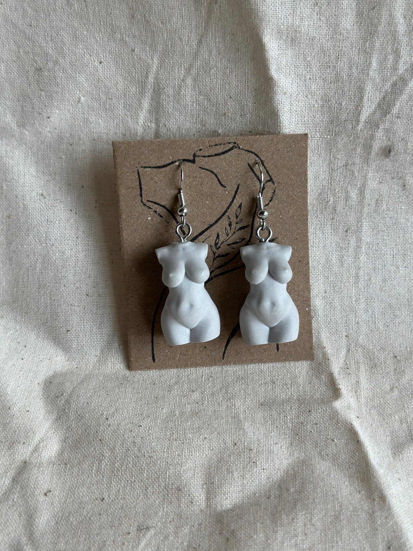 Plus size female body earrings in light grey - silver hooks