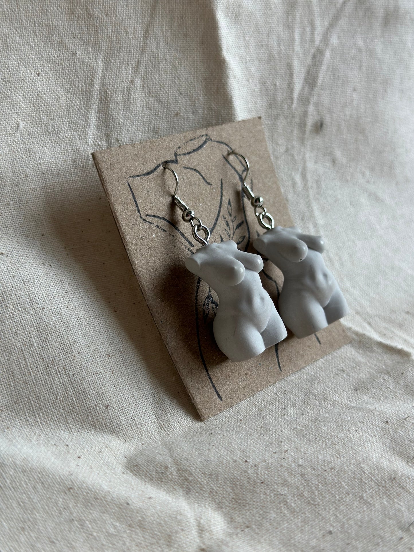 Plus size female body earrings in light grey - silver hooks