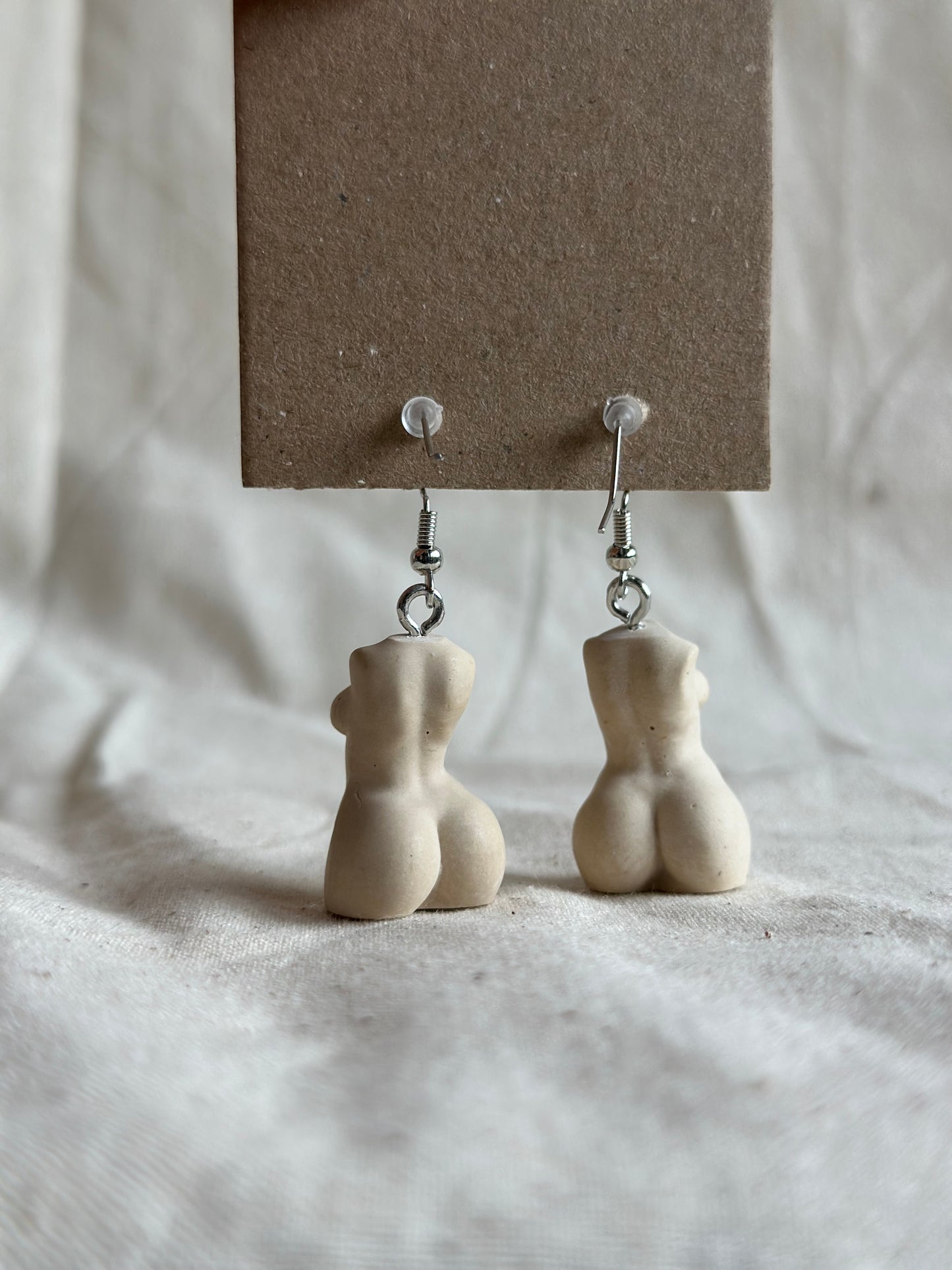 Plus size female body earrings in beige - silver hooks