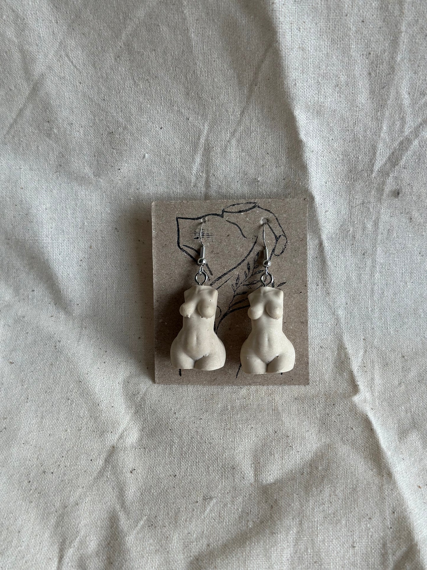 Plus size female body earrings in beige - silver hooks