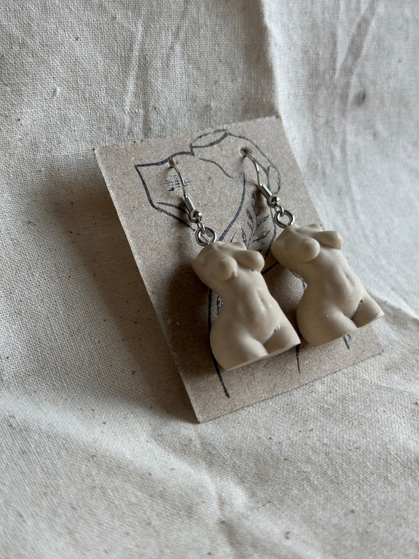 Plus size female body earrings in beige - silver hooks