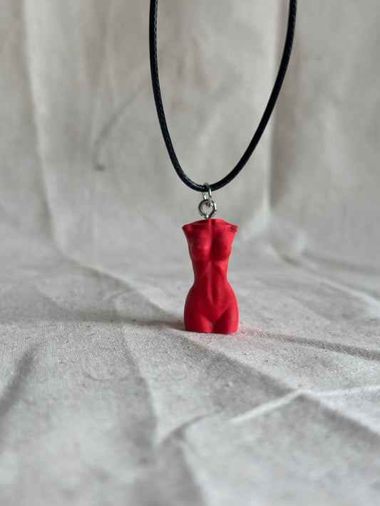 Slim female body necklace in red - black cord