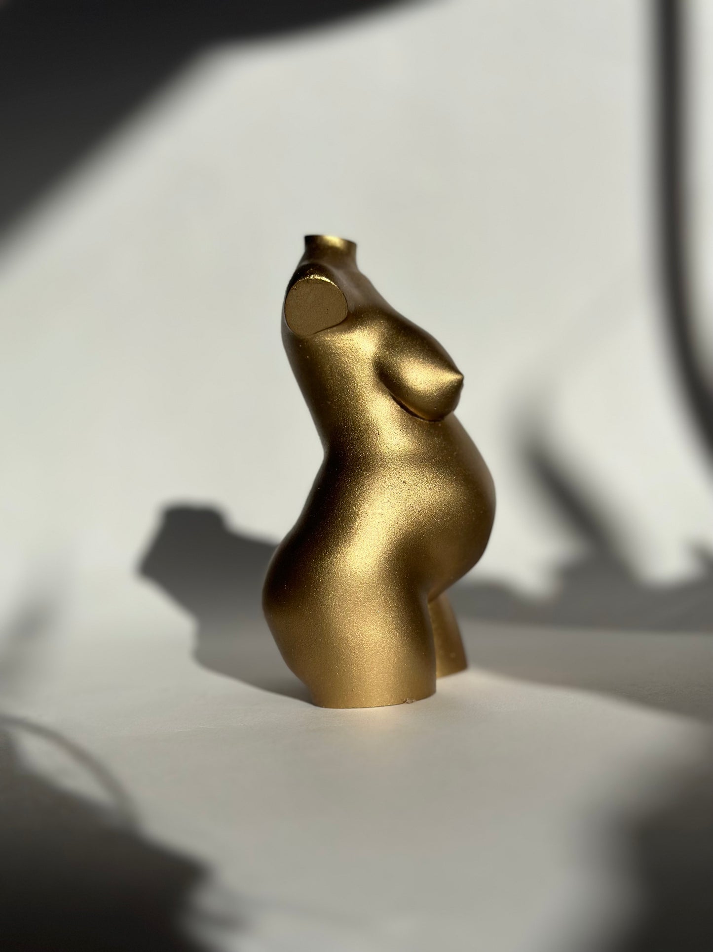 pregnant body sculpture in gold [5 inch]