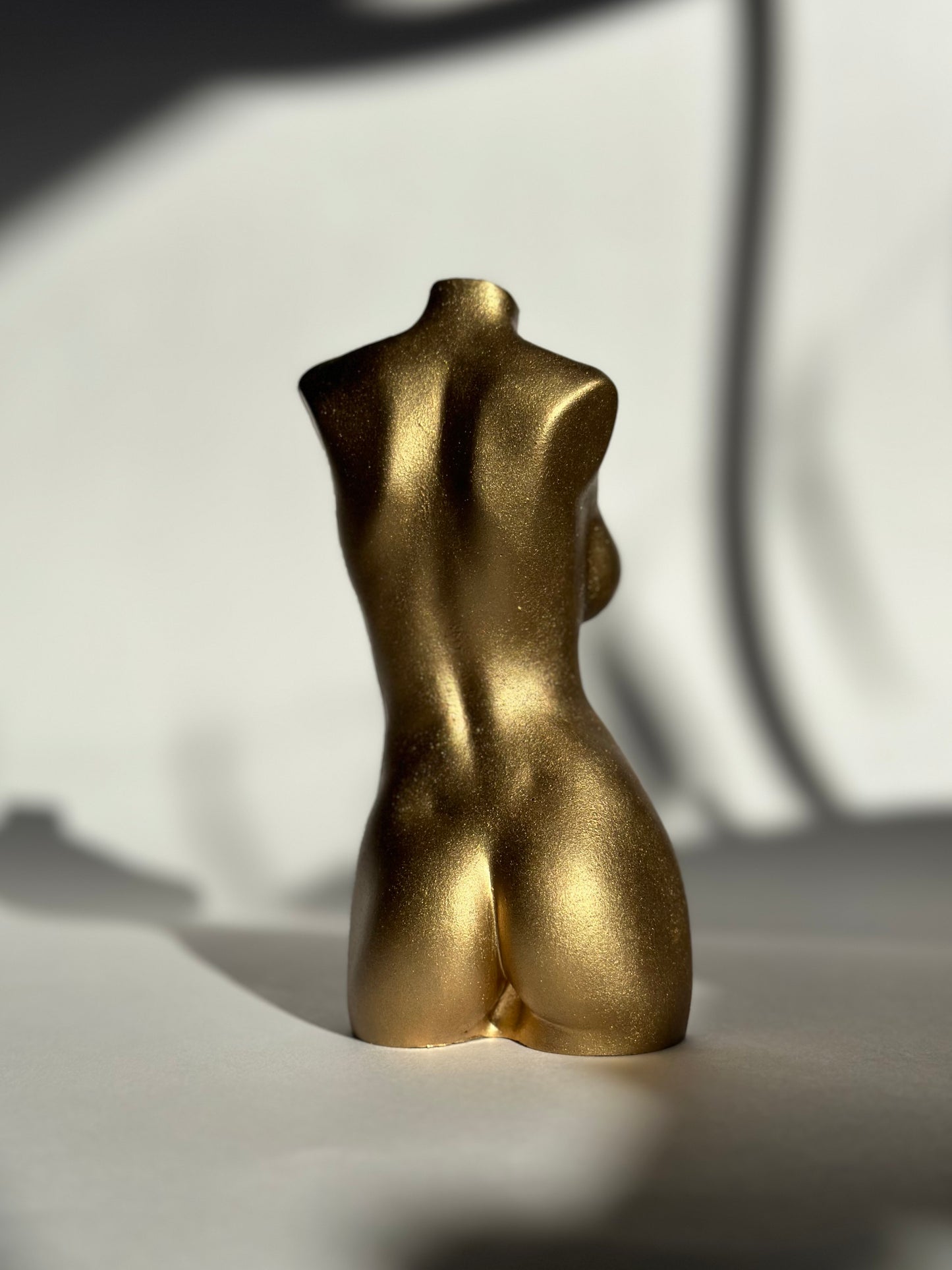 big breast female body sculpture in gold [5 inch]