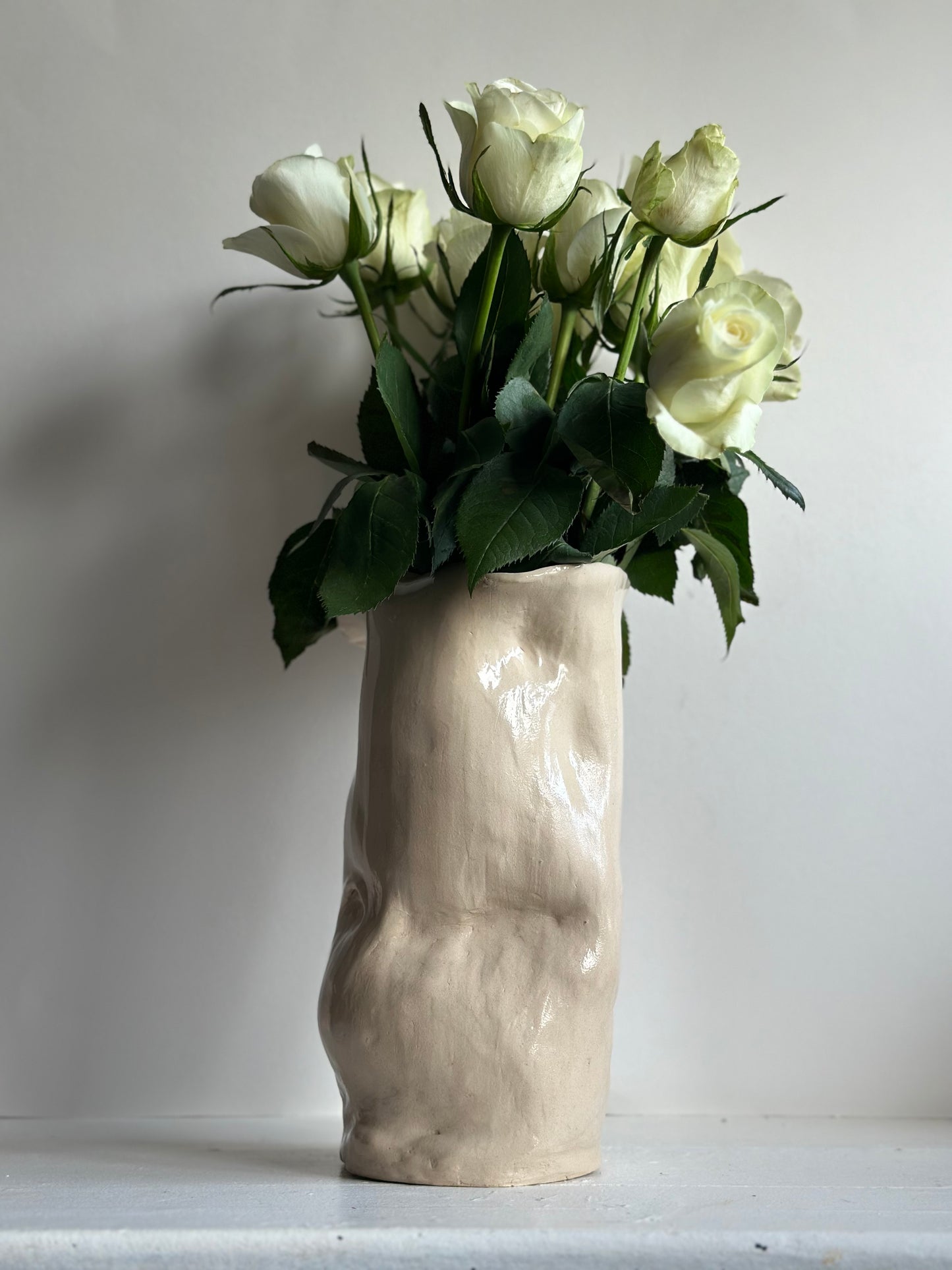 Ceramic belly sculpture vase